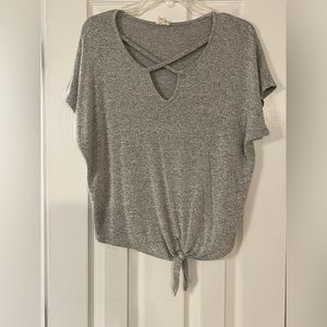 Gray blouse with cute neckline details, also tie up bottom